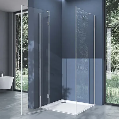 A modern bathroom with a corner shower cabin, a sink, and large windows overlooking a garden.