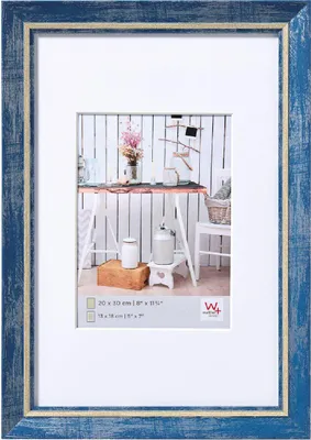 A framed picture with a decorative interior scene.