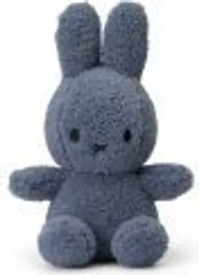 A blue plush bunny toy sitting upright.