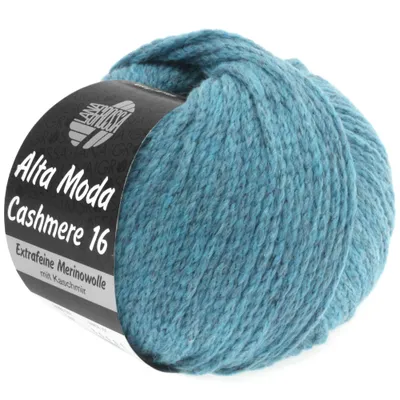 A ball of teal-colored yarn with a label wrapped around it.