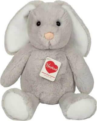 A plush toy bunny is shown sitting against a white background.