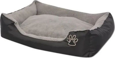 A black and gray dog bed with a paw print logo on the side, shown on a white background.
