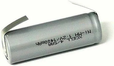 A single silver battery with text printed on it, lying on a white background.