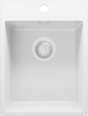 A top-down view of a white kitchen sink with a drain.