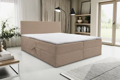 A bed in a room setting.
