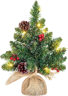 A small, decorated Christmas tree on a white background.