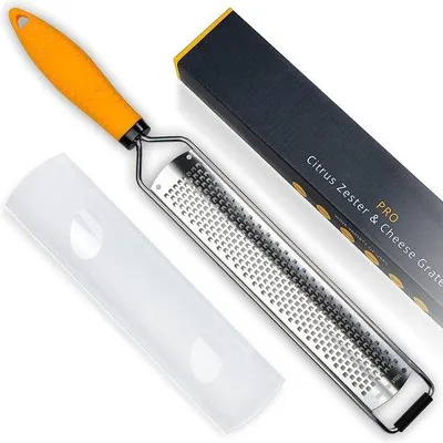 Immagine prodotto di Grattugia in acciaio inossidabile con proprietà antischiuma, grattugia per limoni, utensile da cucina