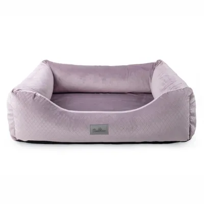 A pink dog bed with raised sides, shown from the front on a white background.
