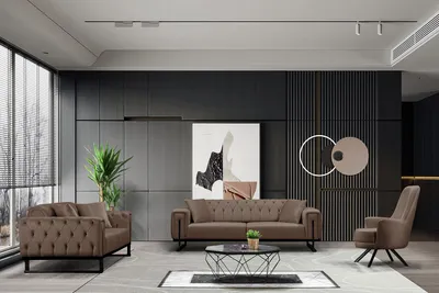 A modern living room setting with a sofa set, coffee table, and artwork.