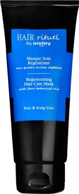 A black tube of Sisley Hair Rituel Regenerating Hair Care Mask with a blue label.