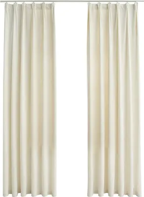 Two cream-colored curtains hanging from a curtain rod against a white background.