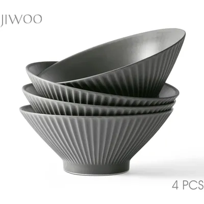 A stack of four grey ceramic bowls with a ribbed texture, presented on a white background.