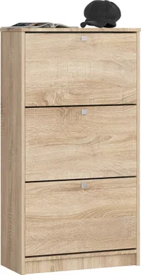 A tall, narrow shoe cabinet with three flip-down drawers, shown against a white background. A dark hat and some papers are placed on top of the cabinet.