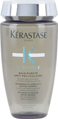 A clear, front-facing studio shot of a Kérastase shampoo bottle.