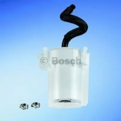 A Bosch fuel pump unit with a black hose attached, set against a light blue gradient background. Two small metal clamps are visible in the lower left corner.
