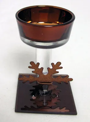 Produktbild von Glas-Teelichthalter braun mit Metallstern 10cm