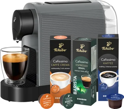 Produktbild von Tchibo Cafissimo „Pure plus“ Kaffeemaschine Kapselmaschine inkl. 30 Kapseln für Caffè Crema, Espresso und Kaffee | 0,8l | 1250 Watt | 11,9 x 33,7 x 24 cm | Grey