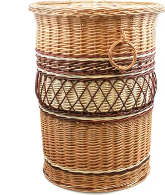 A wicker laundry basket on a white background.