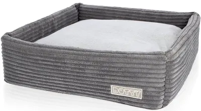A grey corduroy dog bed with a light grey cushion inside, shown from a slightly elevated angle against a white background.