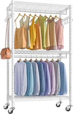 A white metal rolling rack filled with clothes on hangers.
