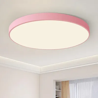 A pink LED ceiling light is mounted on a white ceiling.
