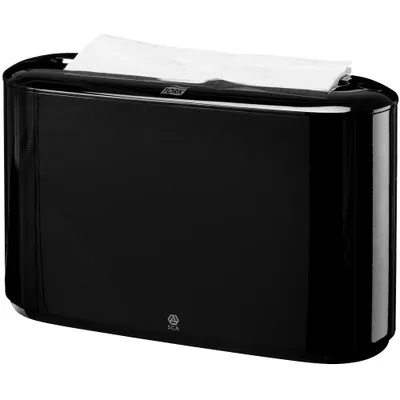 A black paper towel dispenser with white paper towels sticking out of the top.