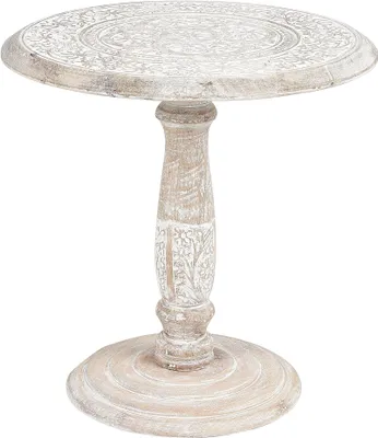 A carved wooden side table with a pedestal base.
