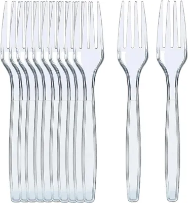 A group of clear plastic forks are arranged in a row, with two additional forks placed to the right.