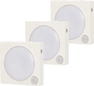 Three white square LED night lights with a circular frosted diffuser and a motion sensor are arranged diagonally.