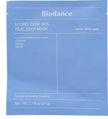 A light blue packaging for a facial sheet mask with product details printed on it.