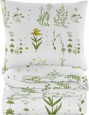 A folded duvet and pillowcase set with a botanical print.