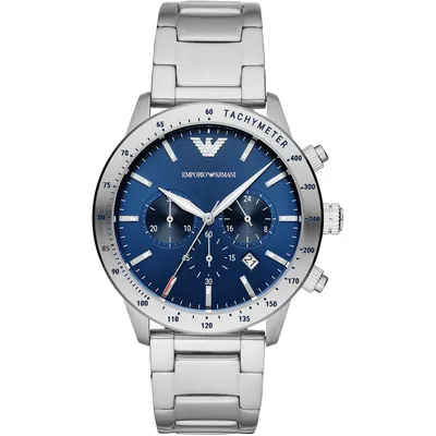 A close-up, front-facing studio shot of a men's wristwatch with a blue dial and silver metal band, set against a white background.