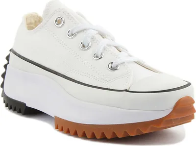 A white Converse Run Star Hike Ox sneaker with a thick platform sole and a gum-colored sole.
