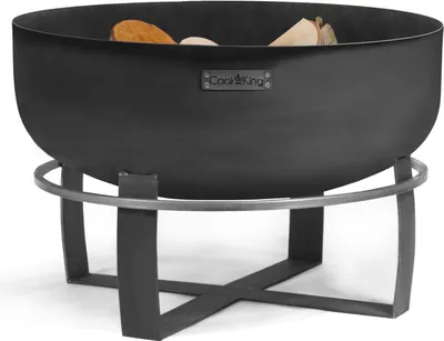A black metal fire pit with wood inside, shown on a white background.