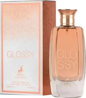 A perfume bottle and its packaging are displayed.