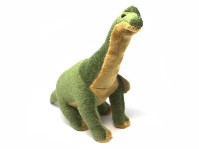 A plush toy dinosaur, a Brachiosaurus, is shown from a slightly elevated side angle against a white background.