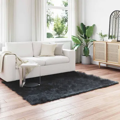 Produktbild von vidaXL Teppich aus Kunstschaffell TAFALLA Schwarz 140 x 200 cm