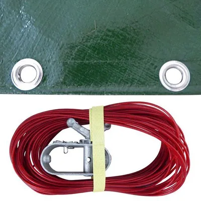 A green tarp with grommets is shown above a coiled red rope with a silver tensioning device and a yellow strap.
