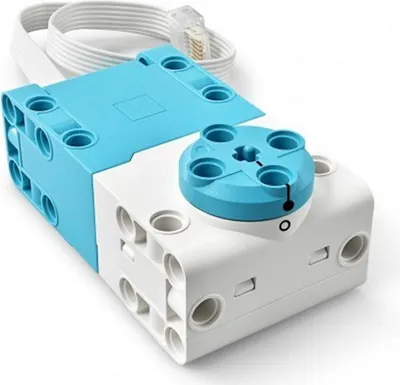 A product shot of a LEGO motor on a white background.