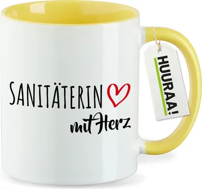 Produktbild von Huuraa Kaffeetasse Sanitäterin mit Herz 330ml Gelb Keramik Kaffeebecher Geschenkidee
