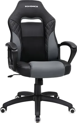 A black and gray gaming chair is shown from the front against a white background.