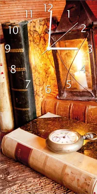 Produktbild von Wallario Design Wanduhr bedruckt, Größe 30 x 60 cm, Motiv: Antike Laterne mit Kerze  alten Büchern und Taschenuhr