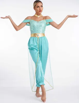 A woman is posing in a costume against a white background.