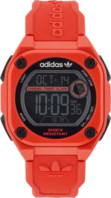 A red digital watch with a black screen displaying the time and date.