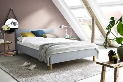 Produktbild von Meise Möbel Kinderbett Lena 120x200 cm | Bettgestell | Kopfteil glatt | Webstoff Eisblau | Holzfuß eichefarbig