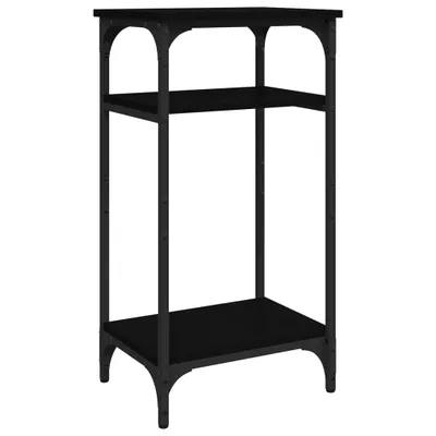 A black three-tiered shelf unit.