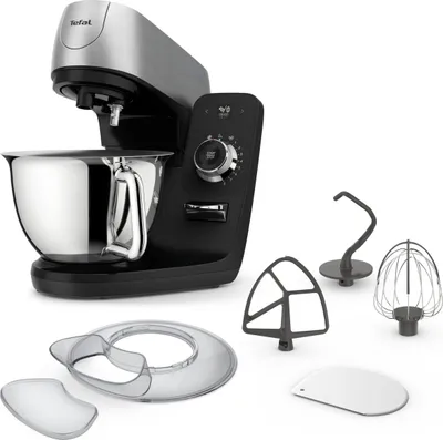 A kitchen mixer with various attachments is displayed against a white background.