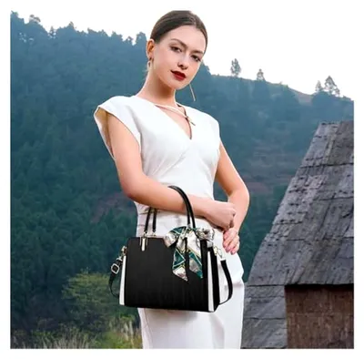 Produktbild von Damen Tote Handtasche mit elegantem Design und vielen Fächern