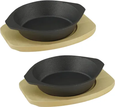 Immagine prodotto di Teglia in ghisa Ø 19 cm con sottopentola in legno 2 pezzi in un set