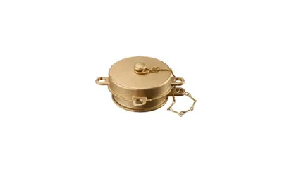 A brass cap with a chain attached, isolated on a white background.